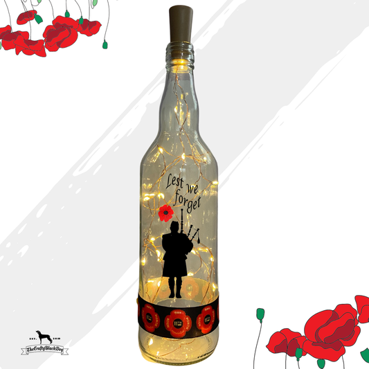Lest We Forget - Bagpiper - Bottle with lights (11th Hour Ribbon)